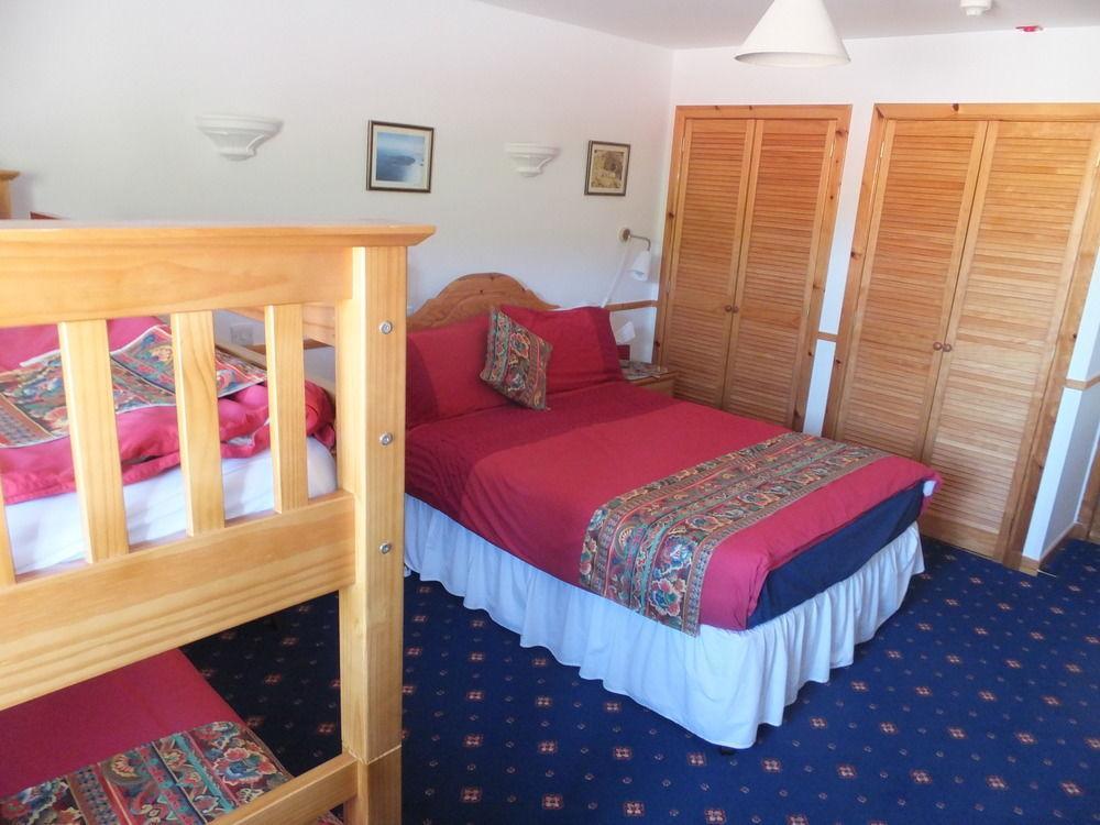 Houton Bay Lodge Орфир Экстерьер фото